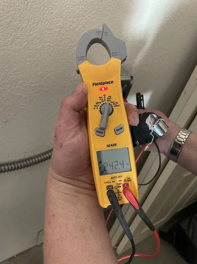 Voltage testing with clamp meter during Electrical Installation Services in Canastota